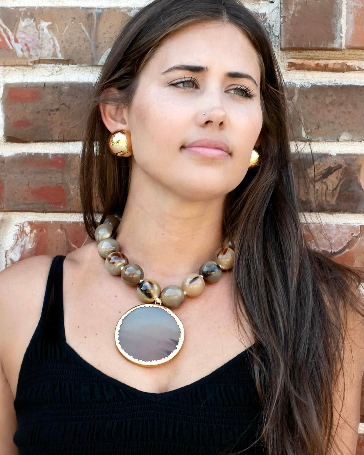 Horn Beaded Necklace with Gold Trimmed Pendant